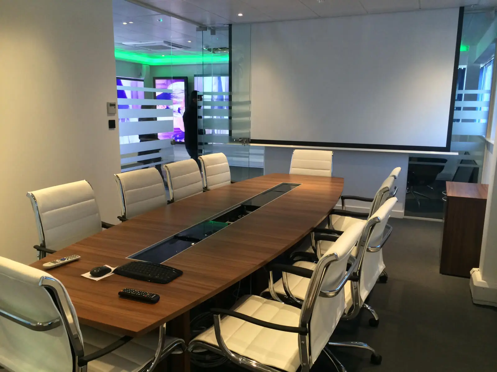 PEL UK Offices space with designer furniture and wall mounted digital screens 16
